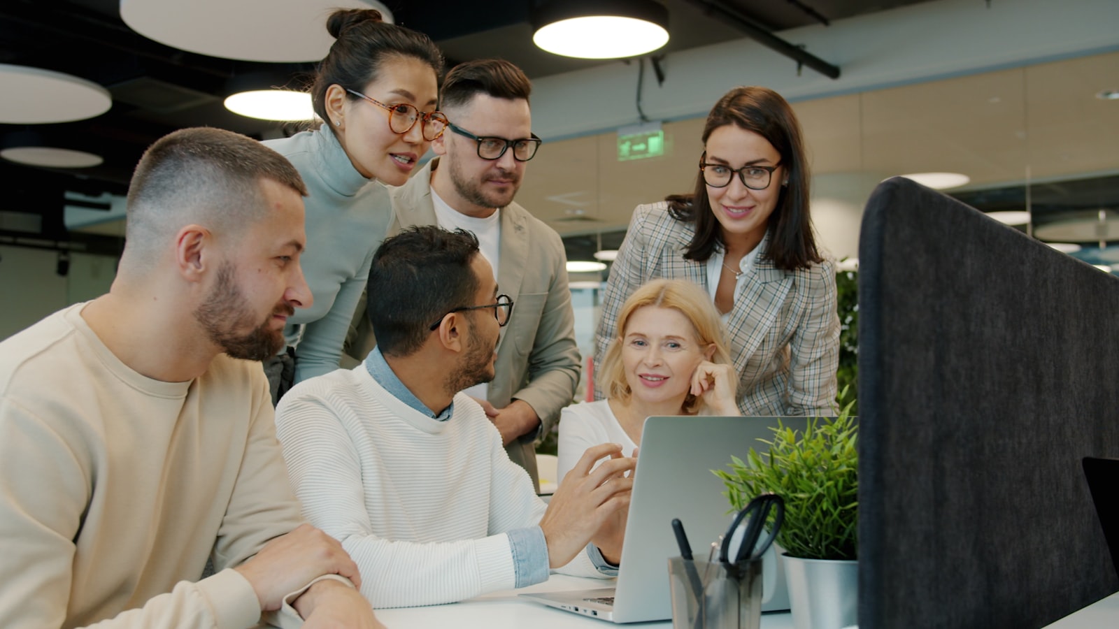 Xmark team reviewing a project